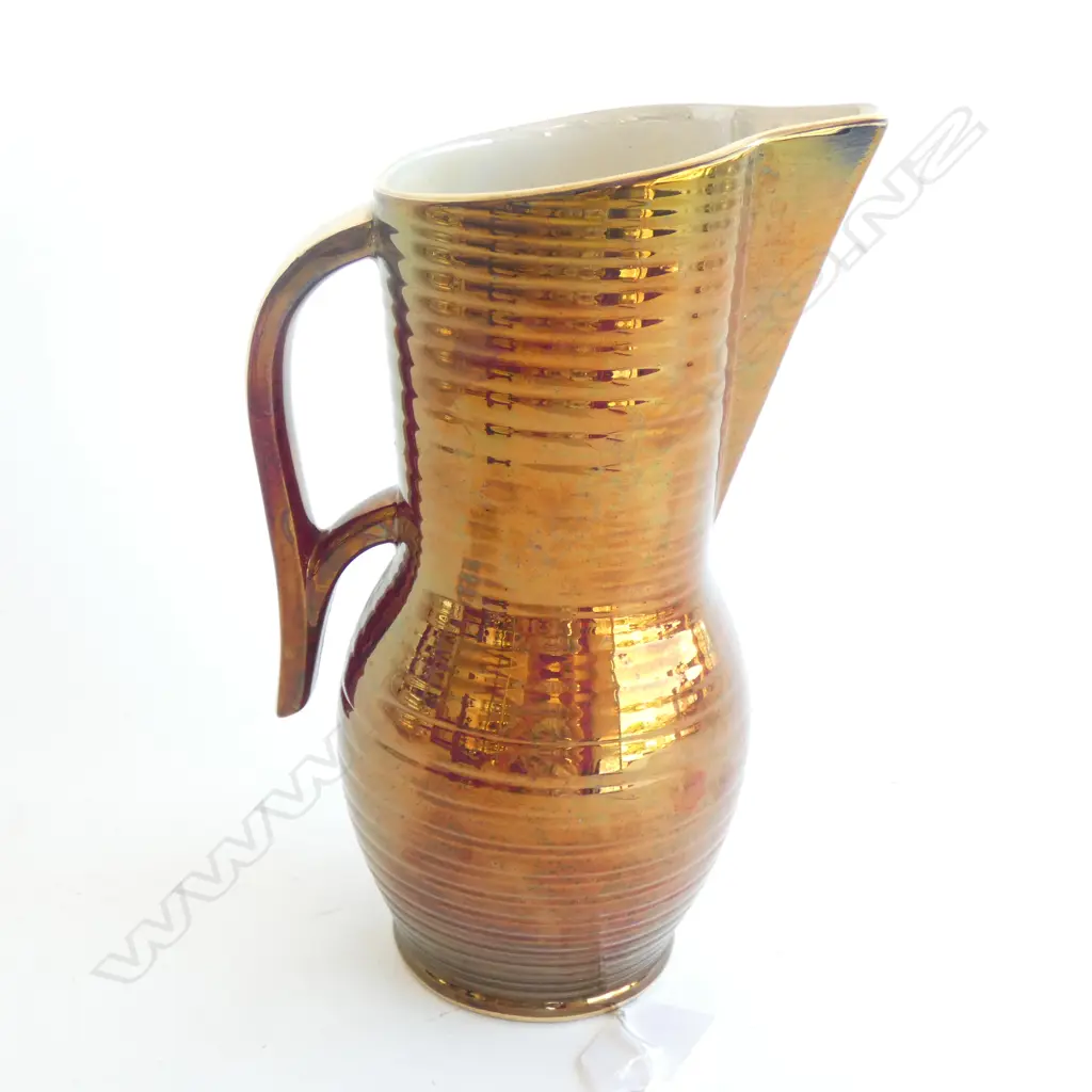 A Crown Devon rouge royale flower ewer. Image 1++